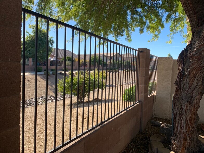 Spacious 4-bedroom, 2-bath home with soaring ceilings, gourmet kitchen, and a heated self-cleaning p - 16426 N 152nd Ln