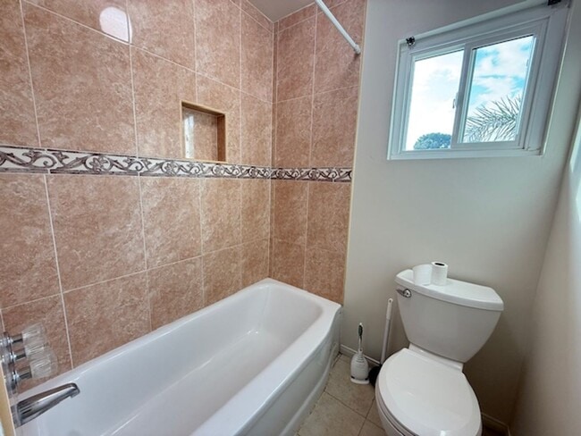 Building Photo - College View Estates Gem – Spacious 3BR Home with Private Yard & RV Parking