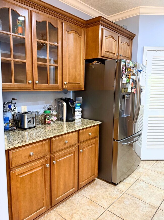 Building Photo - 3/2 with grass cutting included & access to community amenities.