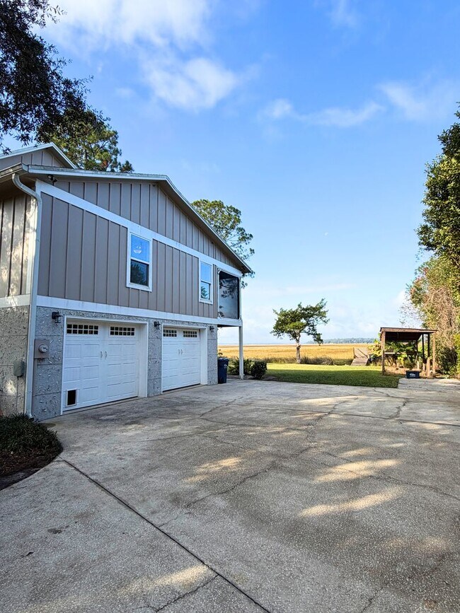 Building Photo - Spacious 4 Bedroom, 2.5 Bath Home with Stunning Marsh Views