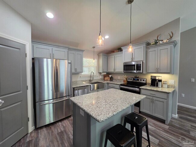 Building Photo - 5565 Riviera Dr