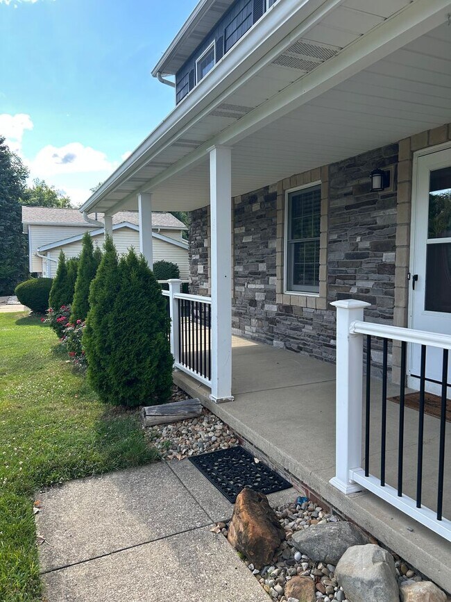 Building Photo - 3 Bedroom Stone Facade Colonial with 2 Car Attached Garage  in Strongsville
