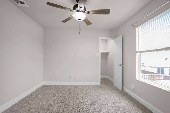 Building Photo - Application fee waived for approved applications. Contact us for details. Spacious 4-bedroom, 2.5...