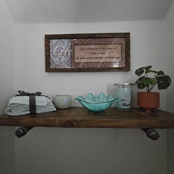 1/2 bathroom at entry and bottom of stairs - 280 E Indigo Dr