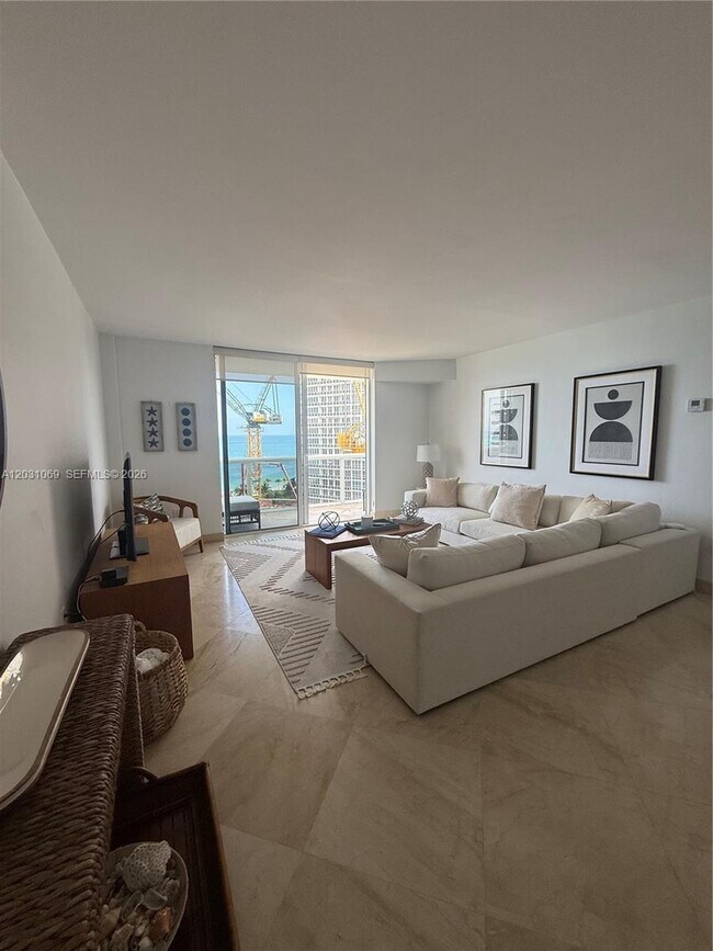 Building Photo - 10275 Collins Ave