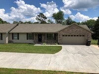 Building Photo - Quaint setting, One Level 3BR/ 2BA 2-Car Garage Condo