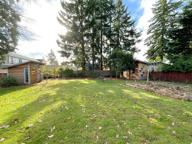 Building Photo - Charming Mid-Century Ranch with Large Yard and Attached Garage