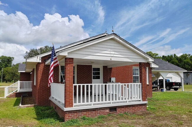 Building Photo - Charming 4-Bedroom Home for Rent – Peaceful & Nature-Filled Setting