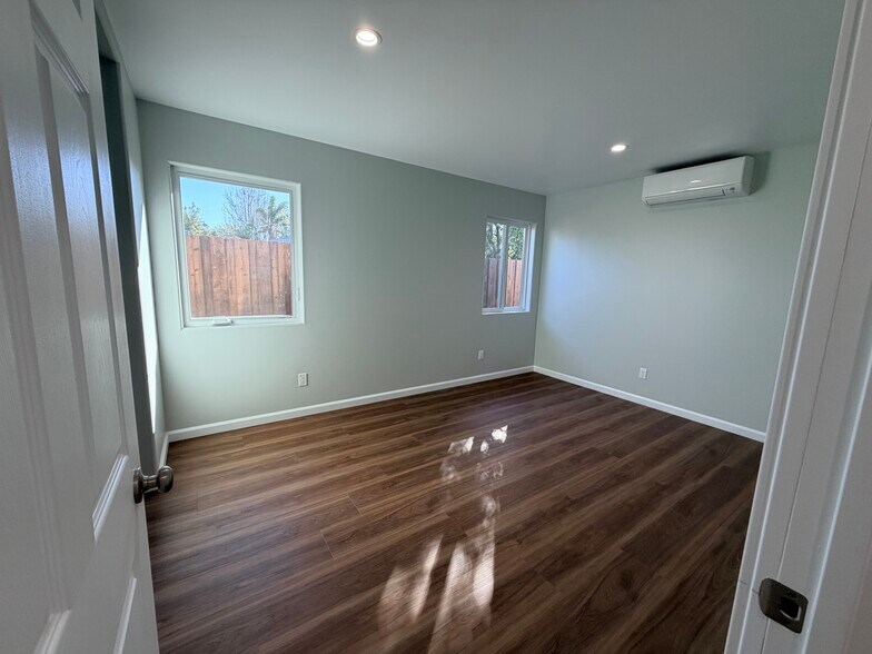 Bedroom 1 with bathroom - 10233 Collett Ave