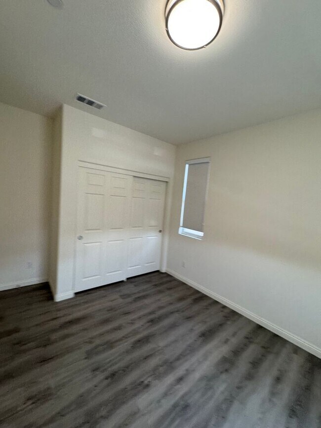 Building Photo - Modern 4-Bed, 2.5-Bath Detached Townhouse in Gated Community with Upgraded Systems & Attached 2-C...