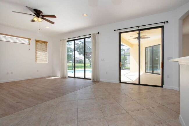 Building Photo - Luxurious Lakefront Living: Spacious 4-Bedroom Home with Pool and Guest Suite in Lakewood Ranch