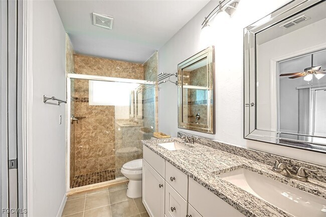 Building Photo - 16840 Sanibel Sunset Ct