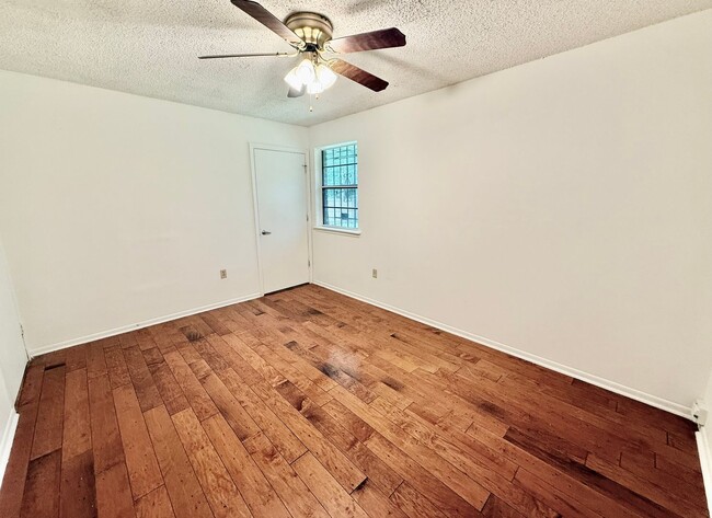 Building Photo - Charming 3BR/2BA Brick Home in Perkins Village – Spacious Yard & Cozy Fireplace