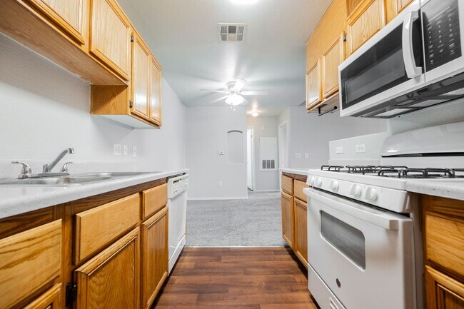 Building Photo - Like-New 2BR/2BA Condo in Gated Manzanita Community – Vaulted Ceilings & Fireplace!