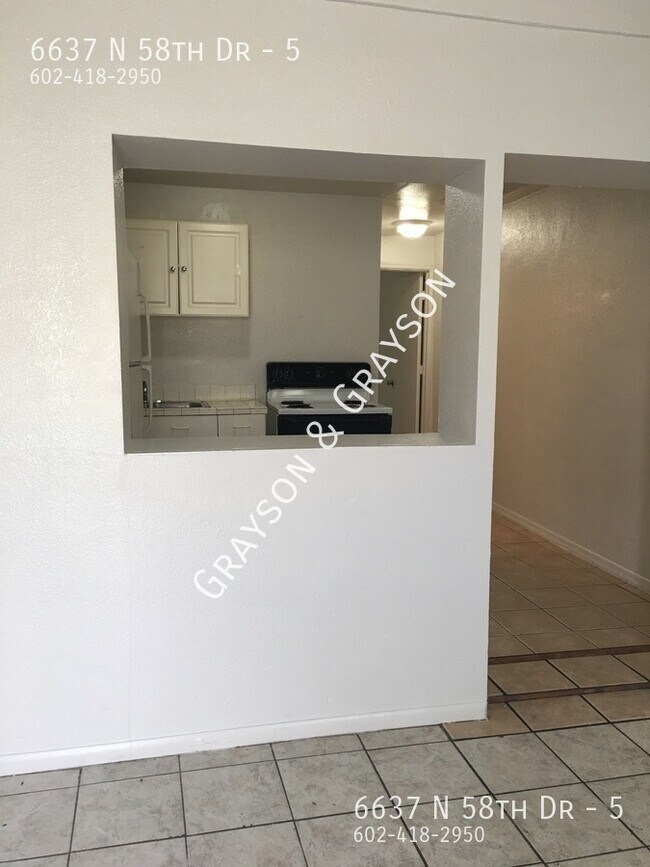 Building Photo - 6637 N 58th Dr