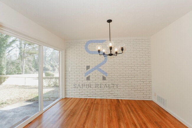 Building Photo - Move in before February 28th and choose your reward: a $250 Amazon Gift Card or a 55" Smart TV!