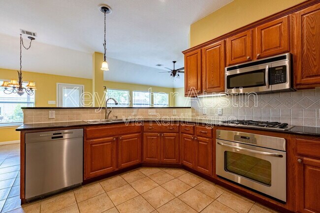 Building Photo - 2601 Tumbling River Dr