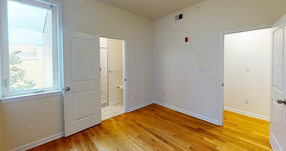 REAR BEDROOM BATHROOM - 303 N 41st St