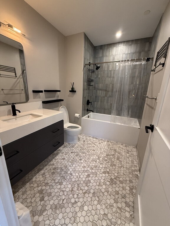 Building Photo - "Charming 1-Bed Boston Retreat with Granite Touches, Cozy Fireplace & Hardwood Elegance!"