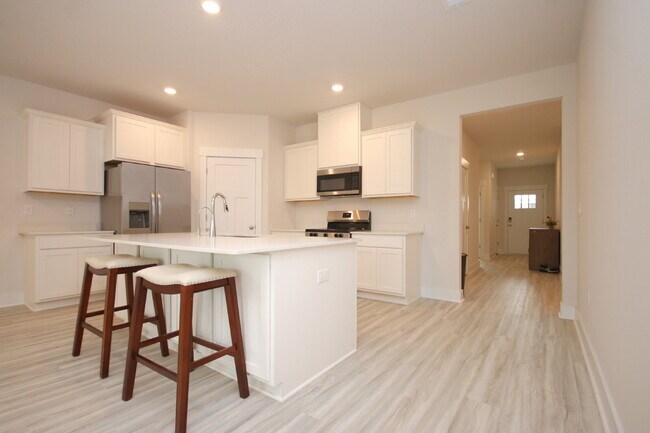 Building Photo - Don’t Miss This 4BR Avalon Home — Modern Interior, Open Floor Plan & Access to Pool, Volleyball &...