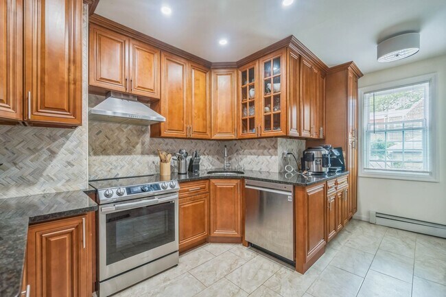 Building Photo - Experience Modern Luxury: Fully Renovated ...