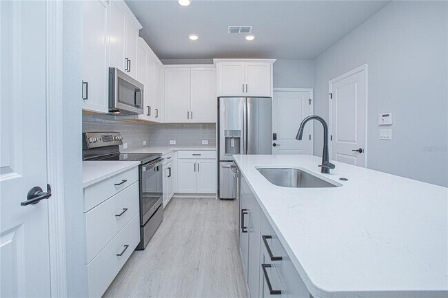 Building Photo - 8637 Tavistock Lakes Blvd
