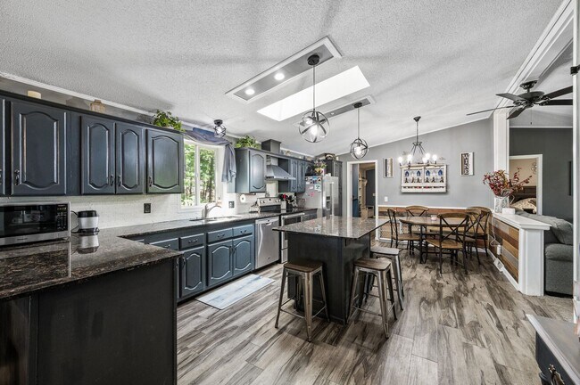 Building Photo - Stunning Rambler on Acreage with Lake Shor...