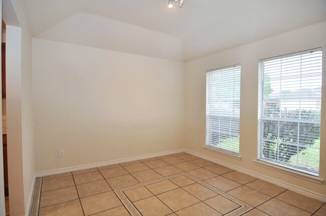 Building Photo - "Warm And Welcoming 3-2-2 With Open Living In a Prime Location!"
