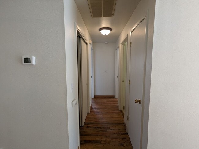 Building Photo - 2x2 duplex with a fenced yard, single-car ...