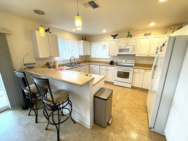 Building Photo - Maui Lani - Furnished 4-bedroom, 3-bathroom home with a 2 car garage