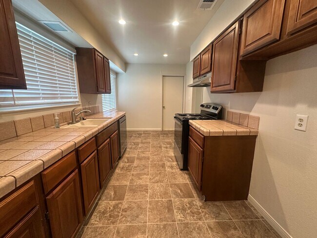 Building Photo - Charming 3-Bed Home with Huge Yard & Fresh Upgrades