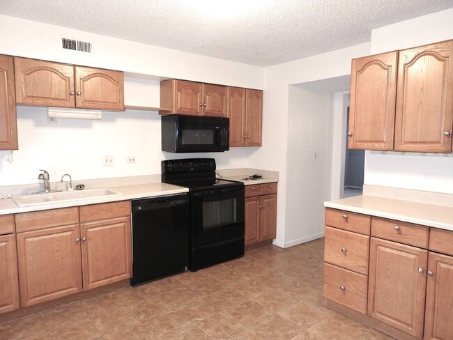 Building Photo - 9370 E Girard Ave