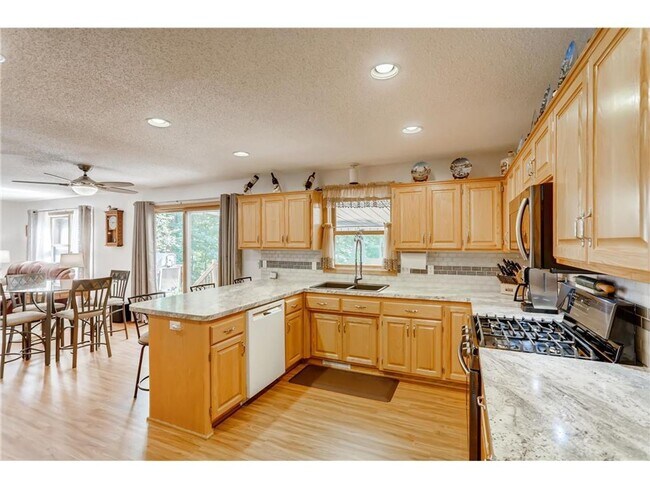 Building Photo - Single Family Home + Over 1/2 Acre Lot!! Welcome Home to Rockford MN!