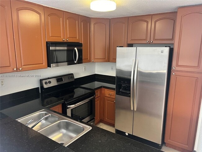 Building Photo - 7090 NW 174th Terrace