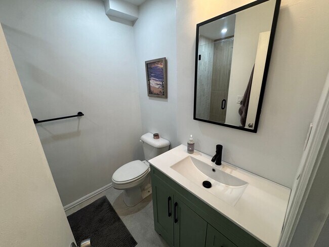 Building Photo - Bright 2BR Townhome with 3 Balconies & Private Patio