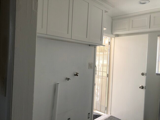 Laundry hook up & Storage - 5727 S Corning Ave