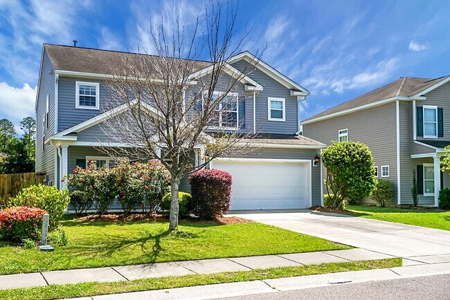 Building Photo - Comfortable Living, 4 BR 2.5 BA Home, Two Car Garage