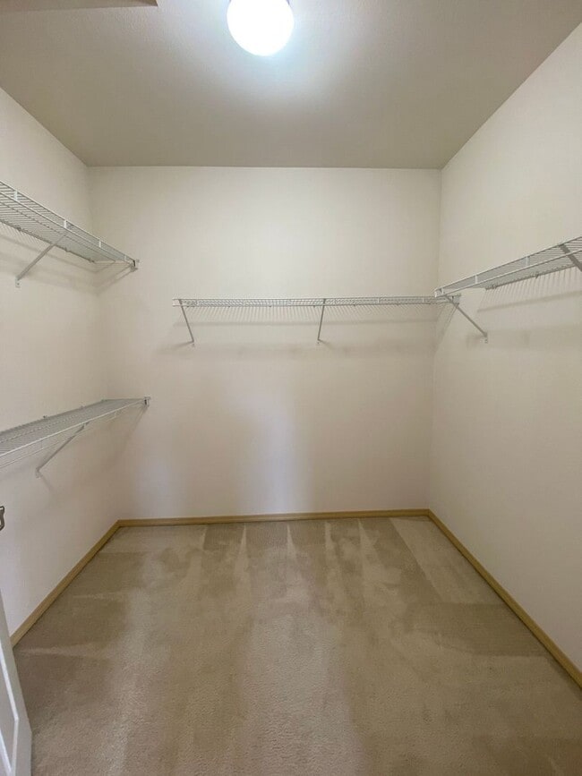 Building Photo - No Mower Needed! Great Townhome In A Beautifully HOA Maintained Community