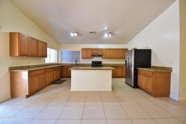 Building Photo - 5570 W Becker Ln