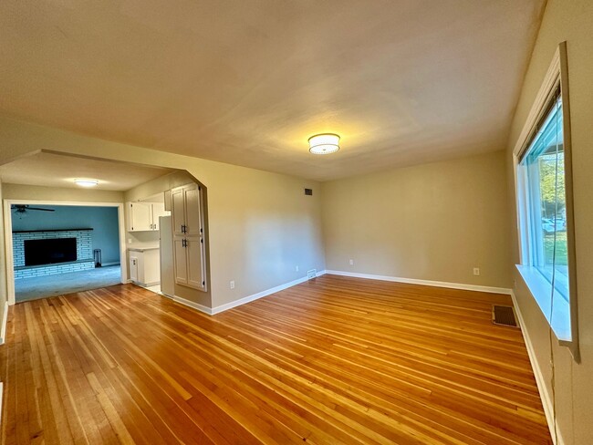 Building Photo - Stunning 2 level home with wood floors and...