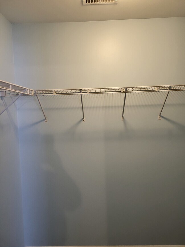 Building Photo - "Charming 2-Bedroom Townhouse on Skillmaster Court with Gleaming Hardwood Floors!"