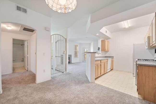 Building Photo - Spacious 3-Bedroom Condo with Garage and Two Private Patios!