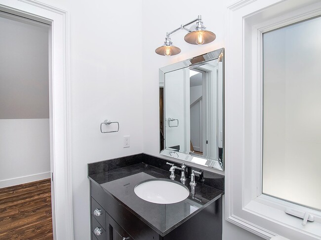 Building Photo - Expansive Loft-Style Carriage House in Private Haller Lake Estate