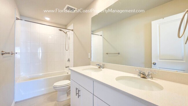 Building Photo - BRILLIANT and SPACIOUS! 4 BEDROOM/2.5 BATH PLUS LARGE BONUS-FLEX SPACE and FENCED YARD!