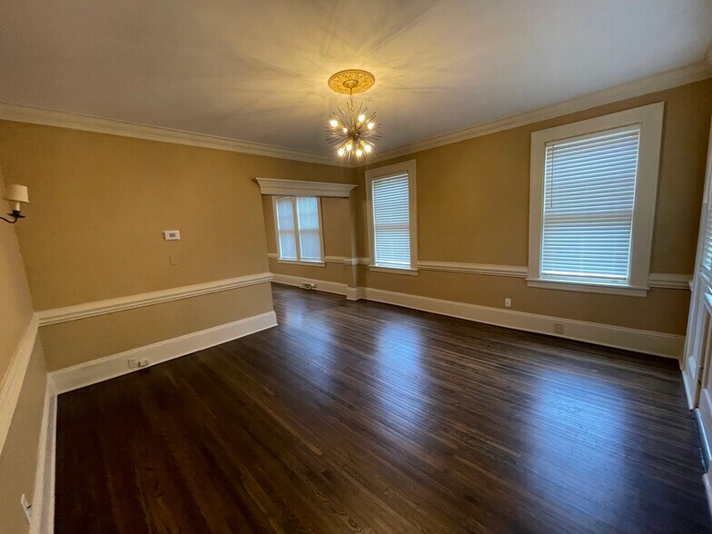large living room with crown/dentil moulding - 418 Clement Ave