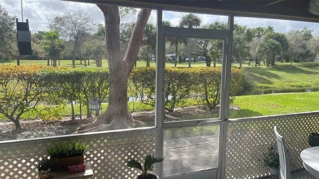 Building Photo - 10138 Royal Palm Blvd