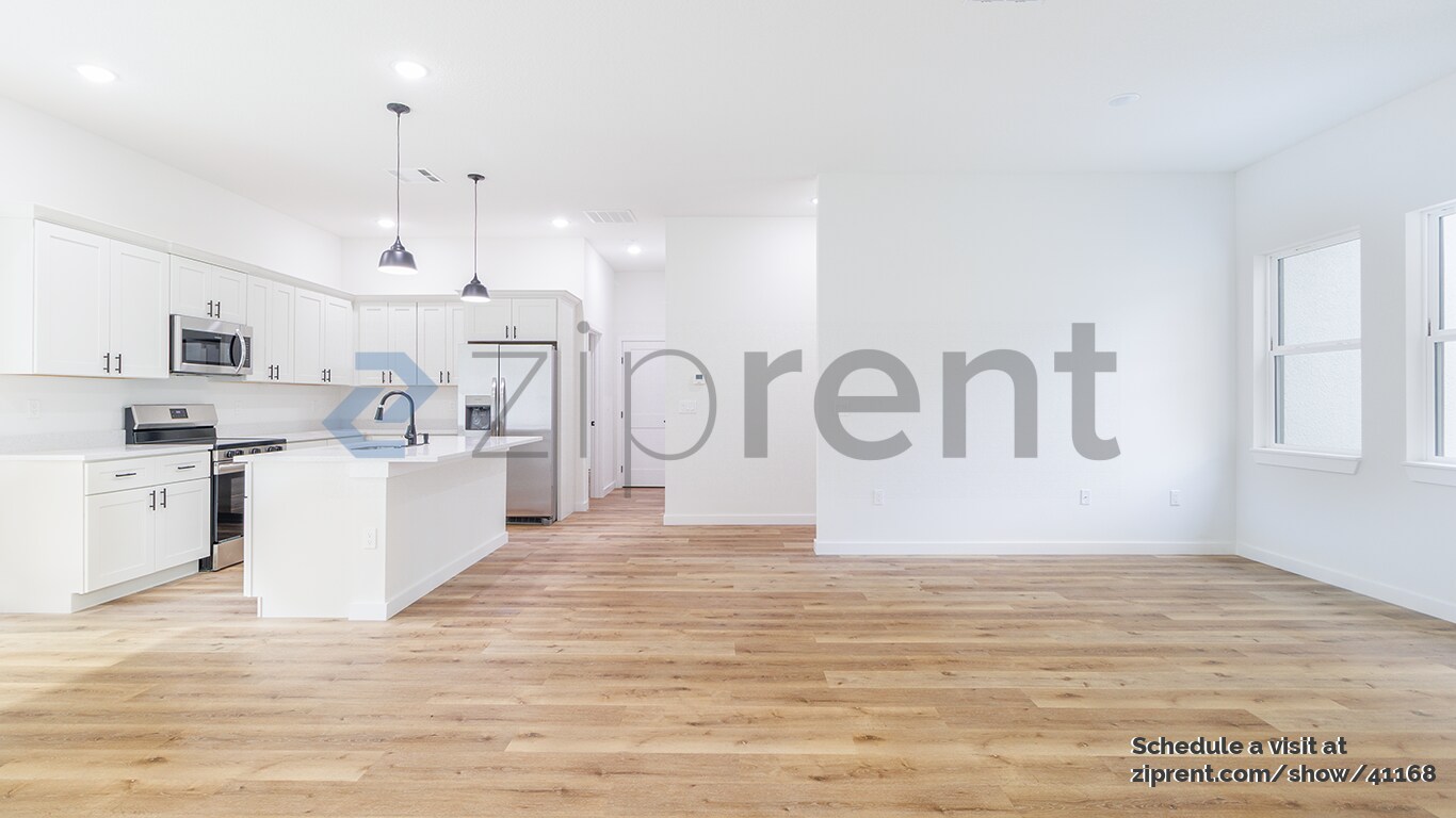 Building Photo - 8202 N Triana Dr