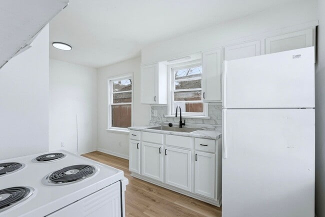 Building Photo - Updated 3 BR with Garage & Basement