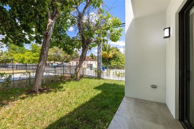 Building Photo - 6852 NW 4th Ave