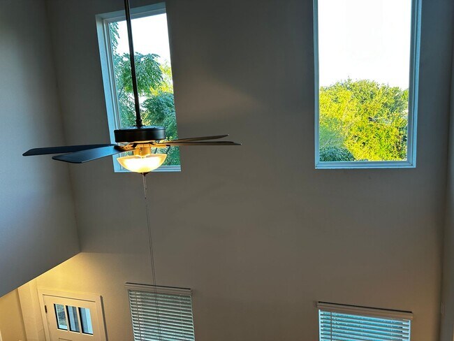 Building Photo - For Lease – Modern 2023 Condo Backing to Greenbelt | Creekside at Pioneer Crossing West